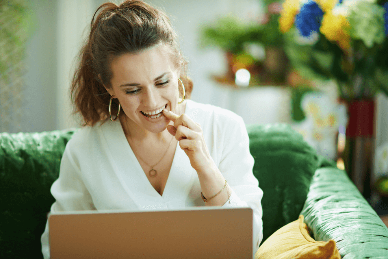 woman having teledentistry at home consultation